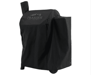 A grill cover placed on a Traeger grill